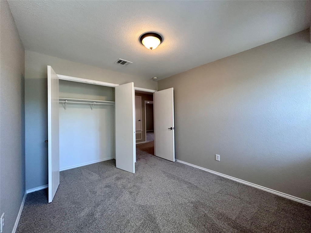 8916 Ipswich Bay Drive Austin, TX 78747 - Photo 27 of 39 a view of an empty room