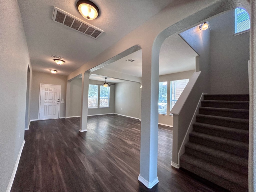 8916 Ipswich Bay Drive Austin, TX 78747 - Photo 5 of 39 a view of entryway and hall with wooden floor
