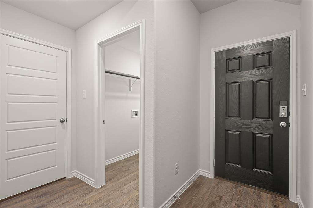 1508 Romans Road Ennis, TX 75119 - Photo 3 of 19 walk in closet with wooden floor