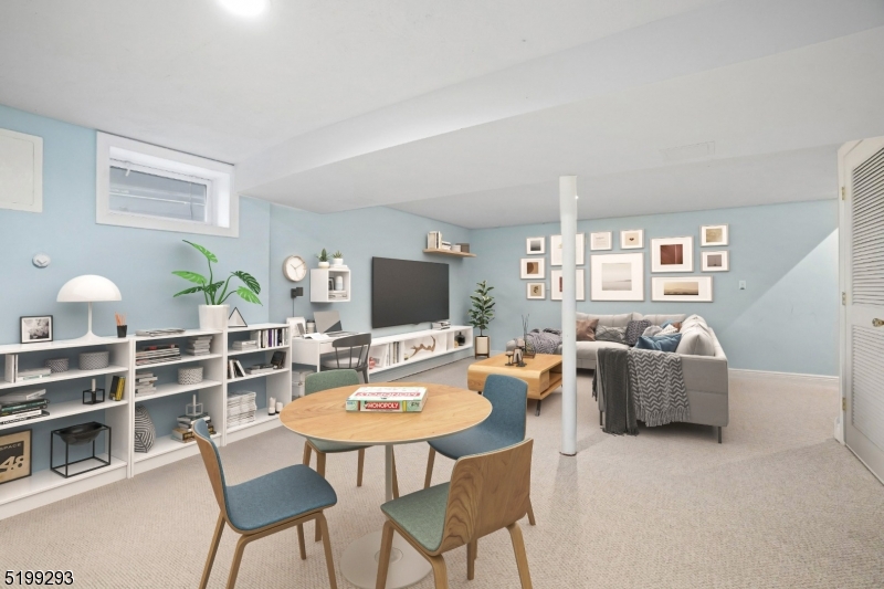 8 Corsi Road Bloomfield, NJ 07003 - Photo 11 of 11 a living room with furniture and a flat screen tv
