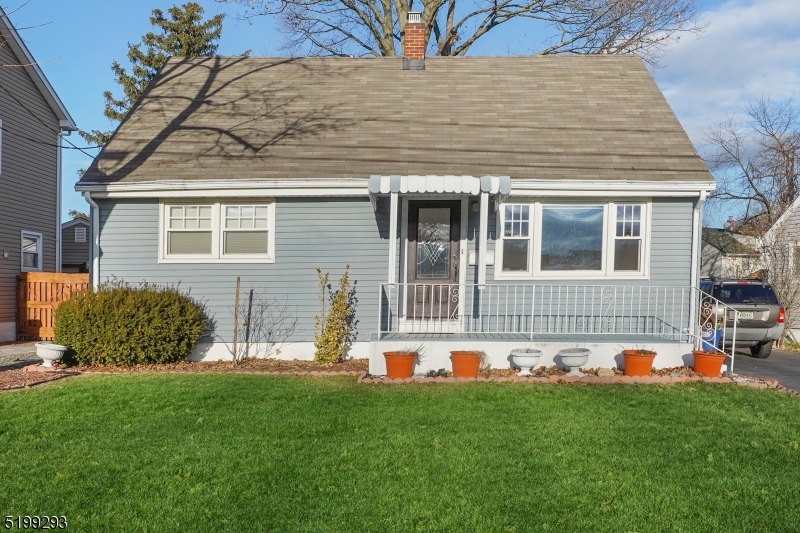 8 Corsi Road Bloomfield, NJ 07003 - Photo 2 of 11 a front view of house with yard