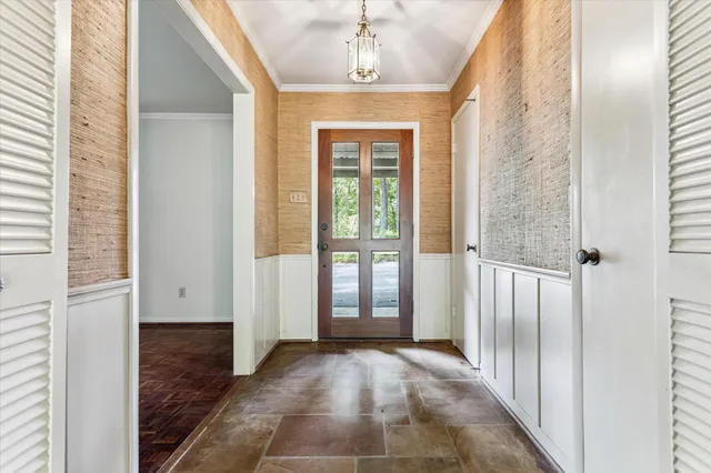 a view of entryway with wooden floor