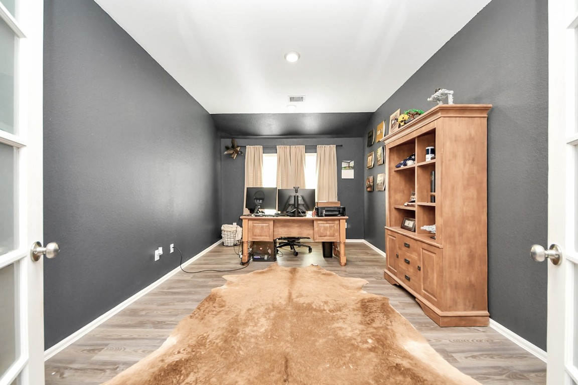 2835 Mistygate Court Conroe, TX 77301 - Photo 19 of 35 A dedicated space to focus, create, or unwind. It's designed to fit your lifestyle.
