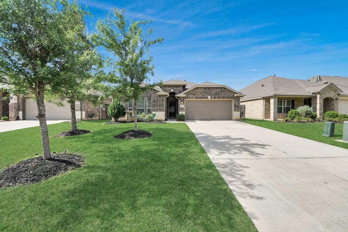 2835 Mistygate Court Conroe, TX 77301 - Photo 35 of 35 A home that combines comfort, space, and inviting outdoor appeal, ready for you to make it your own.