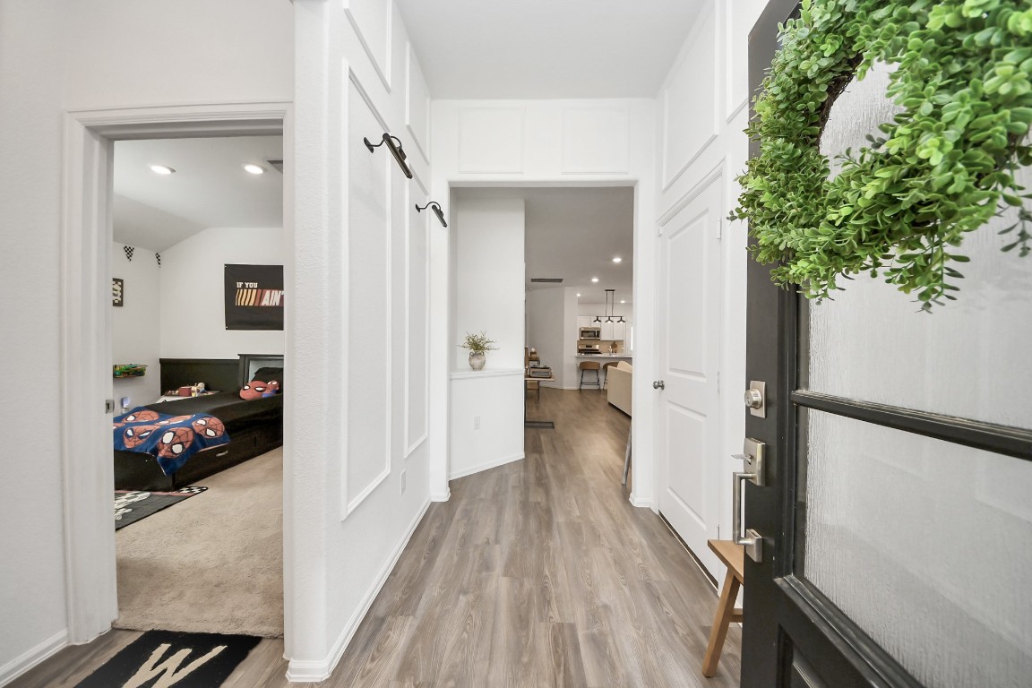 2835 Mistygate Court Conroe, TX 77301 - Photo 4 of 35 Step inside to a bright, welcoming entry with clean lines and a seamless flow into the main living spaces.