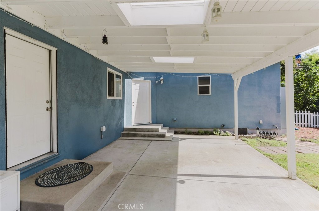 17134 Sherman Way Lake Balboa, CA 91406 - Photo 9 of 27 a bathroom with a sink and a mirror