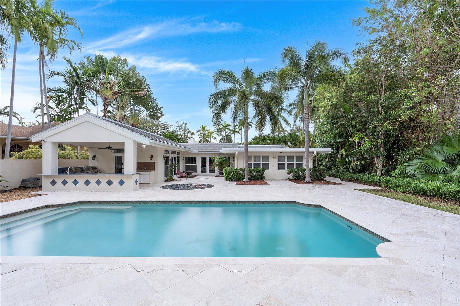 414 Riviera Isle Drive Fort Lauderdale, FL 33301 - Photo 49 of 70 a view of a house with pool and sitting area
