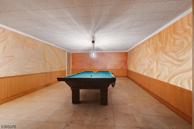 a room with a table and a potted plant