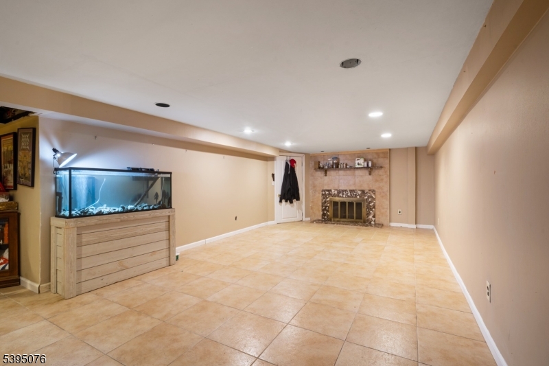 24 Woodland Road Clark, NJ 07066 - Photo 28 of 45 a view of a livingroom with furniture
