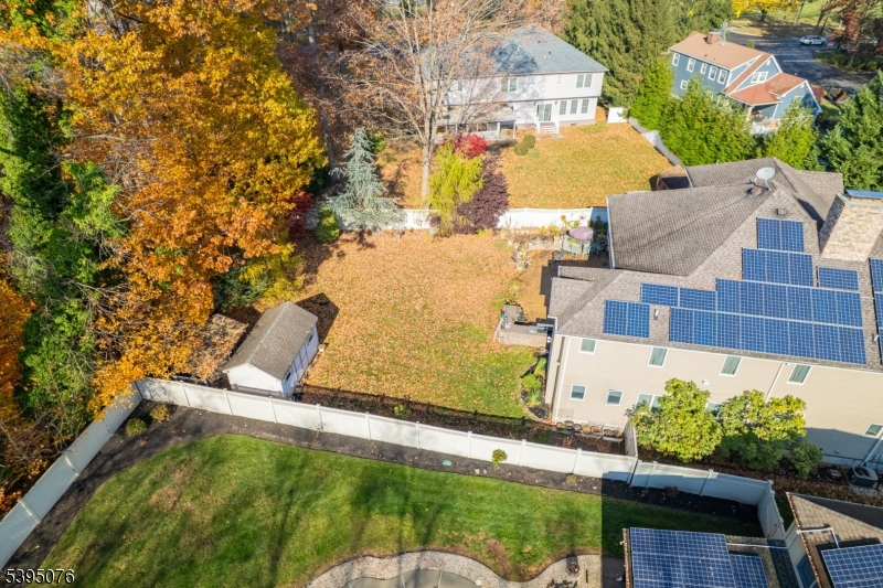 24 Woodland Road Clark, NJ 07066 - Photo 35 of 45 an aerial view of residential houses with outdoor space and street view