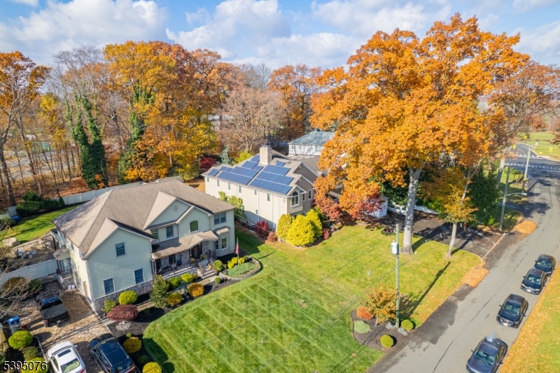 24 Woodland Road Clark, NJ 07066 - Photo 37 of 45 an aerial view of a house with a yard basket ball court and outdoor seating