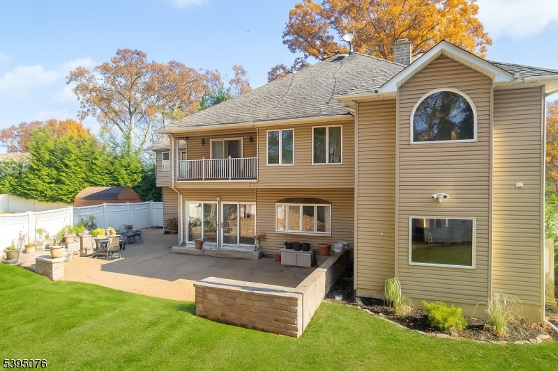 24 Woodland Road Clark, NJ 07066 - Photo 39 of 45 a front view of a house with a yard