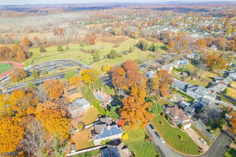 24 Woodland Road Clark, NJ 07066 - Photo 40 of 45 an aerial view of residential houses with outdoor space