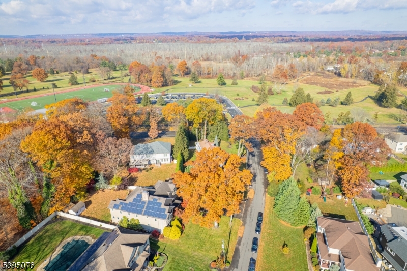 24 Woodland Road Clark, NJ 07066 - Photo 4 of 45 an aerial view of residential building and lake view