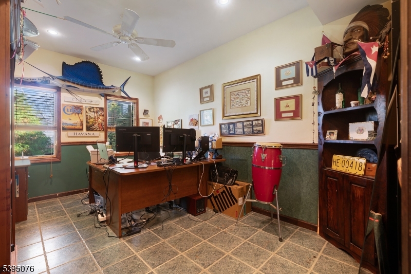 24 Woodland Road Clark, NJ 07066 - Photo 7 of 45 a view of a workspace with furniture and a workspace