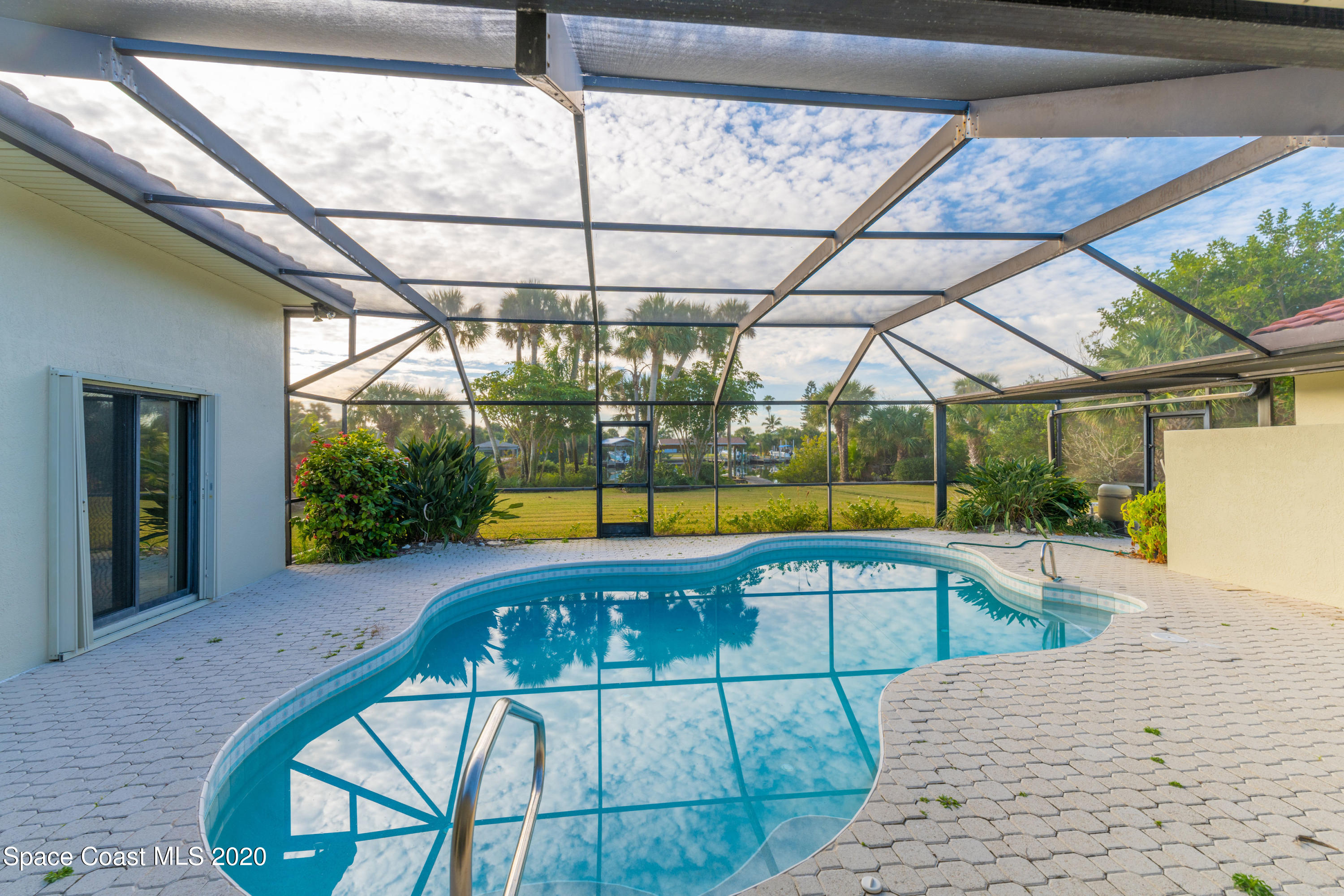 365 Riggs Avenue Melbourne Beach, FL 32951 - Photo 2 of 12 Screened pool 2