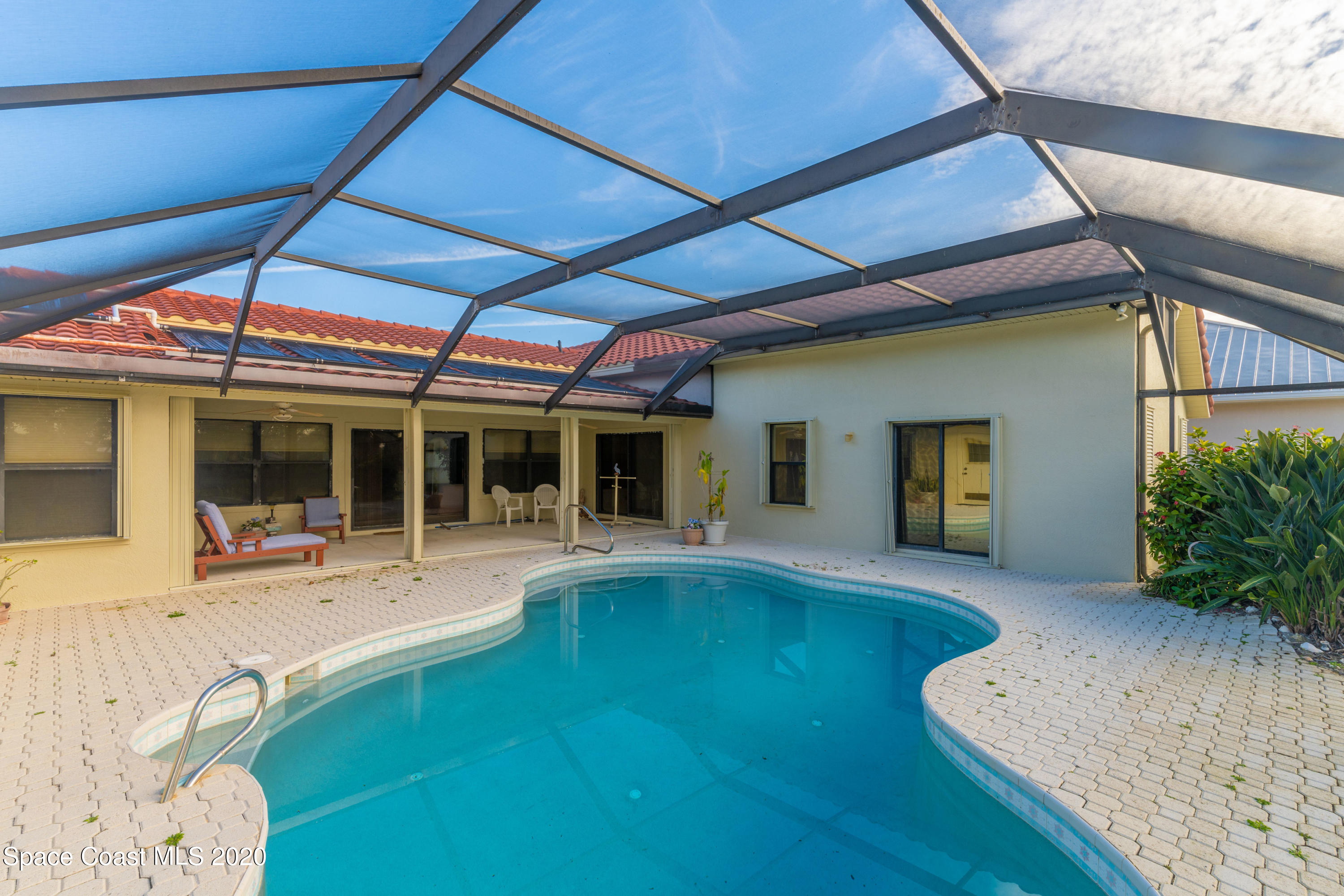 365 Riggs Avenue Melbourne Beach, FL 32951 - Photo 3 of 12 Screened pool