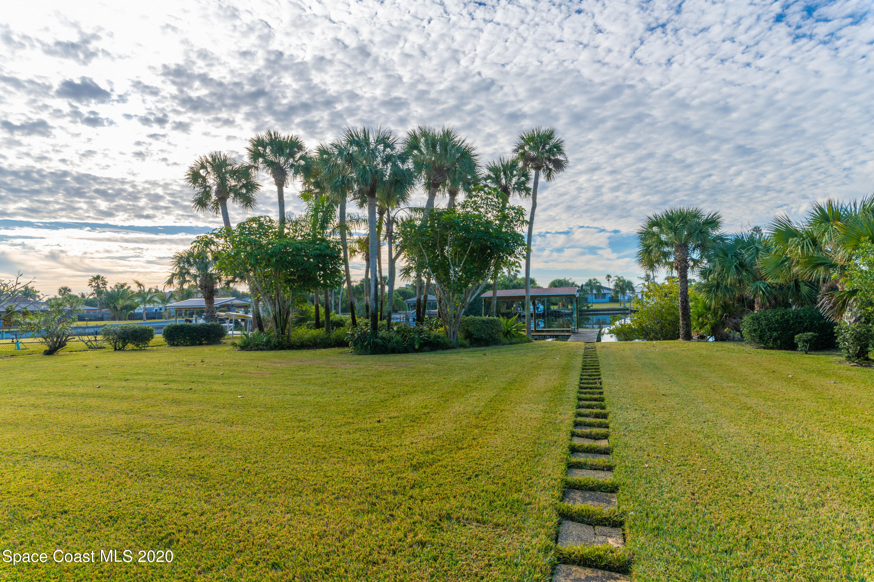 365 Riggs Avenue Melbourne Beach, FL 32951 - Photo 5 of 12 back view to South