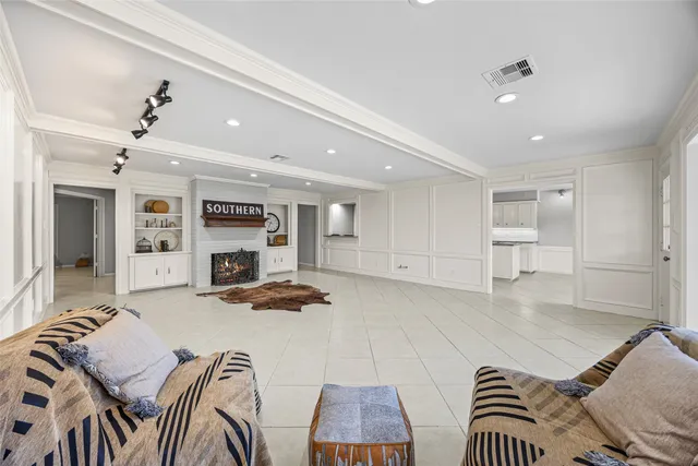 a view of a room with a large window