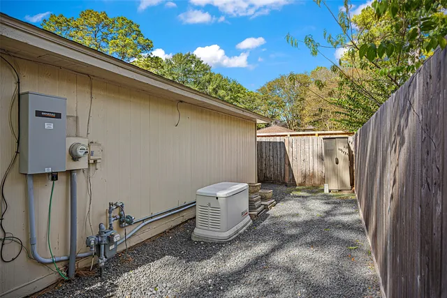 an aerial view of a house with outdoor space