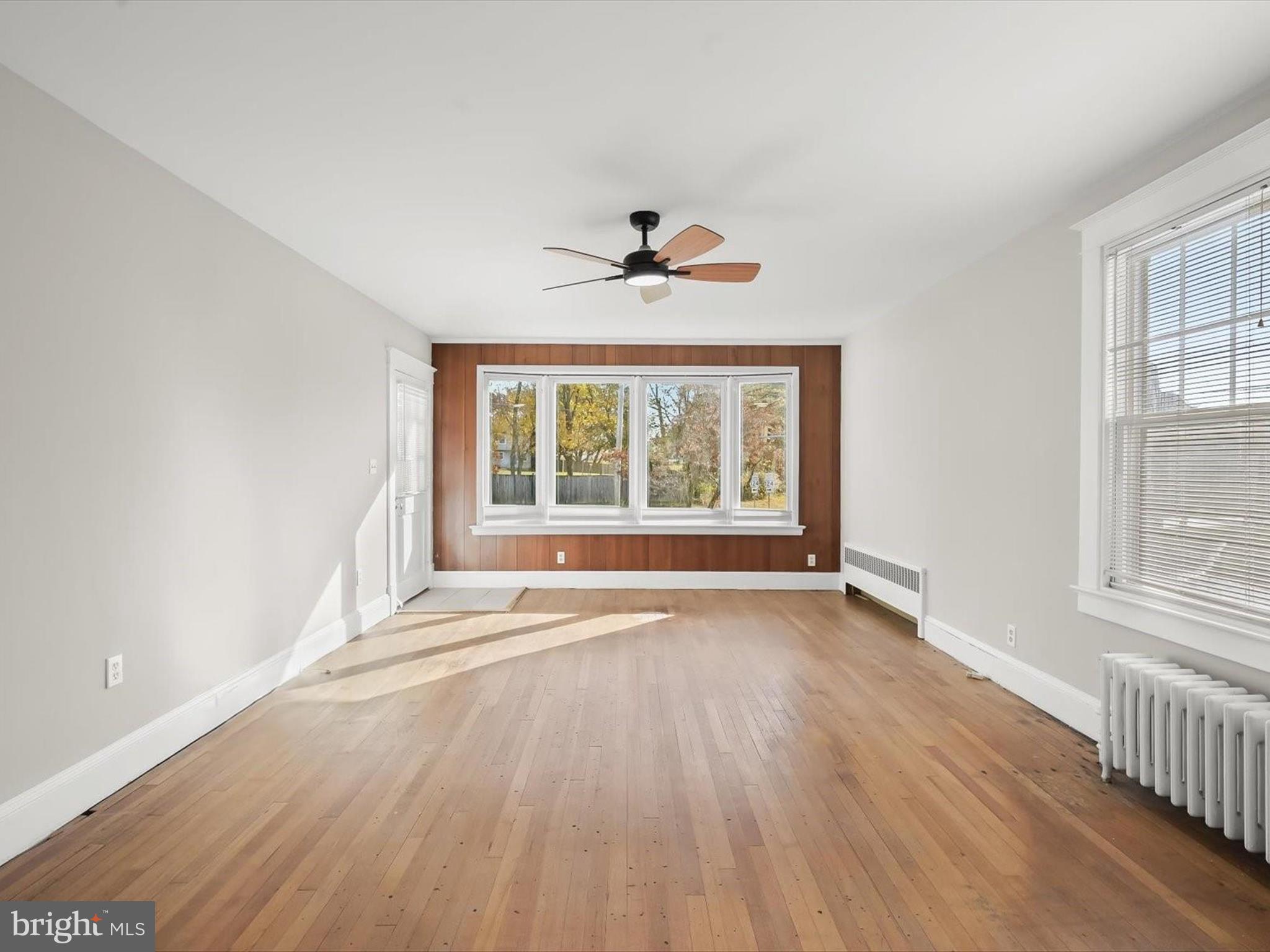 24600 Woodfield Road Damascus, MD 20872 - Photo 11 of 60 Living Room - Bay Window - Hardwood Floors