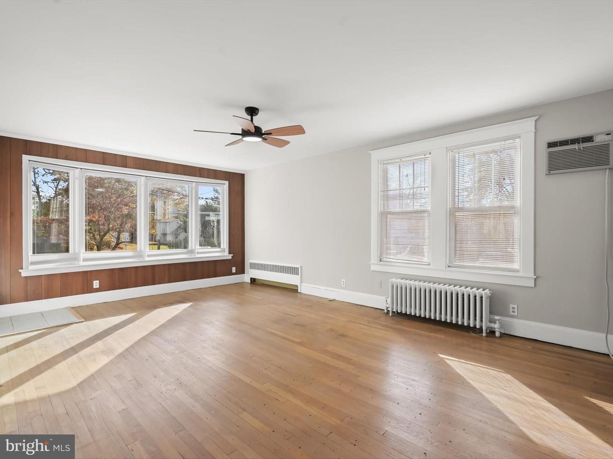 24600 Woodfield Road Damascus, MD 20872 - Photo 12 of 60 Living Room - Bay Window - Hardwood Floors