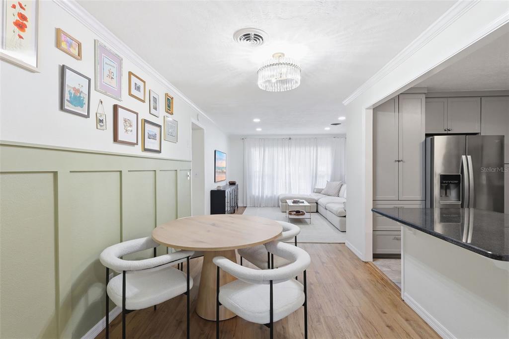 1291 Oxford Road Maitland, FL 32751 - Photo 18 of 37 a view of a dining room with furniture window and wooden floor