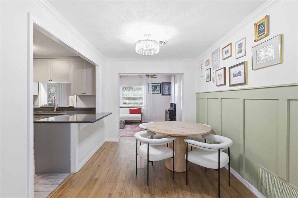 1291 Oxford Road Maitland, FL 32751 - Photo 20 of 37 a view of a dining room with furniture window and wooden floor