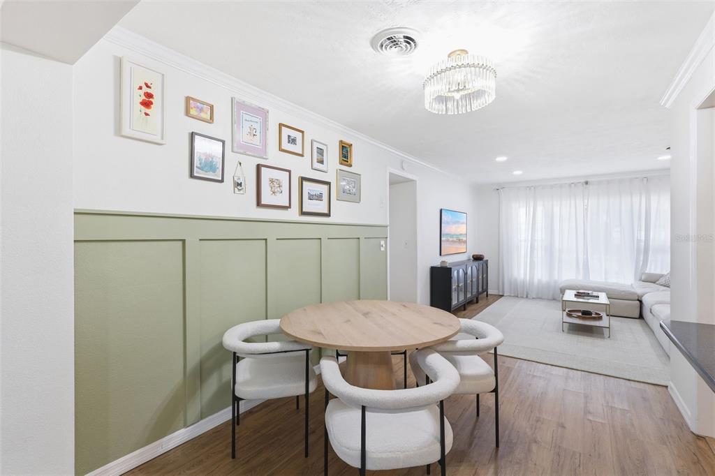 1291 Oxford Road Maitland, FL 32751 - Photo 21 of 37 a view of a dining room with furniture window and wooden floor