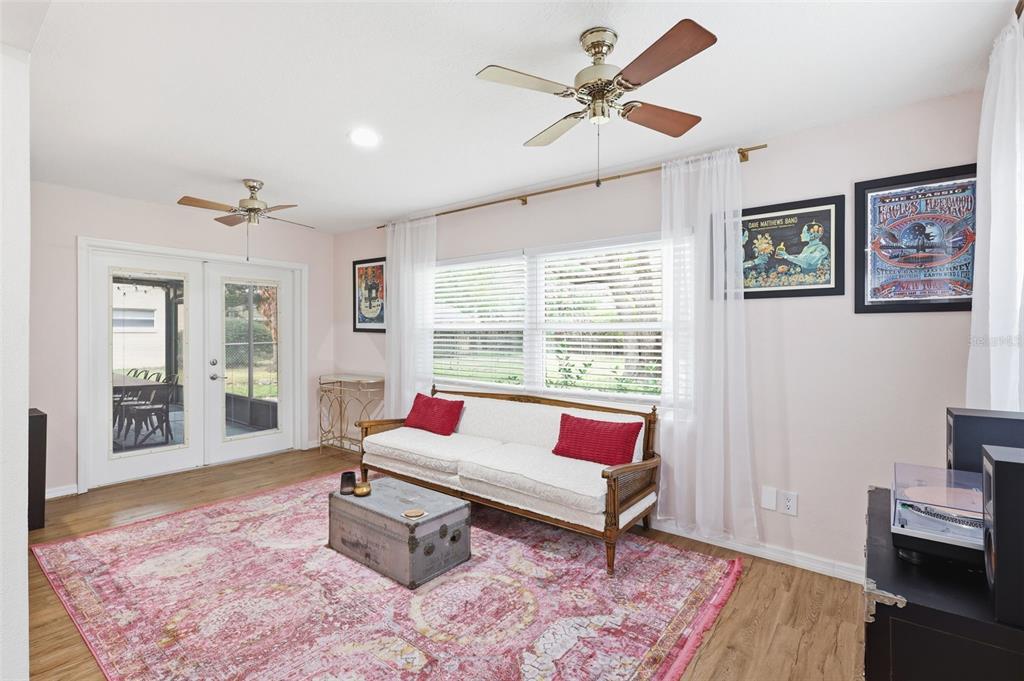 1291 Oxford Road Maitland, FL 32751 - Photo 23 of 37 a living room with furniture rug and window