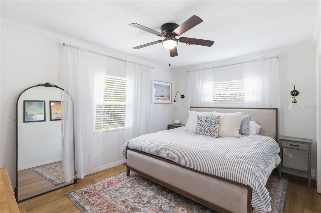 1291 Oxford Road Maitland, FL 32751 - Photo 26 of 37 a bedroom with a large bed and a window