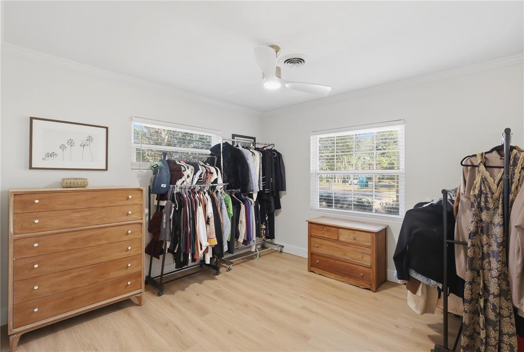 1291 Oxford Road Maitland, FL 32751 - Photo 29 of 37 a view of walk in closet with clothes and shoes