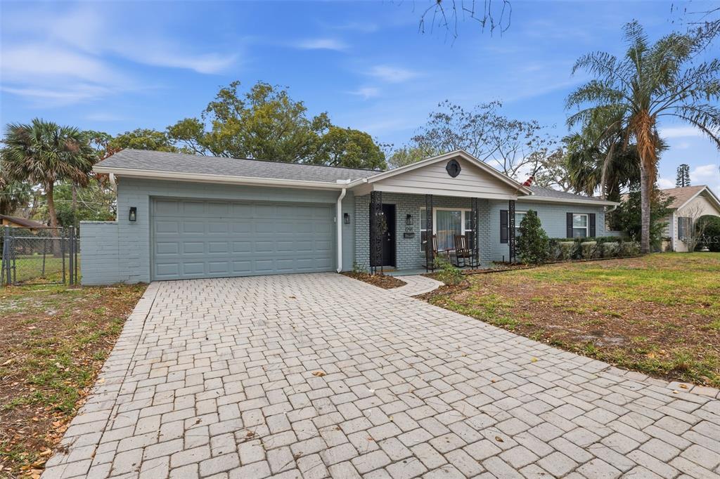 1291 Oxford Road Maitland, FL 32751 - Photo 3 of 37 a front view of a house with a yard