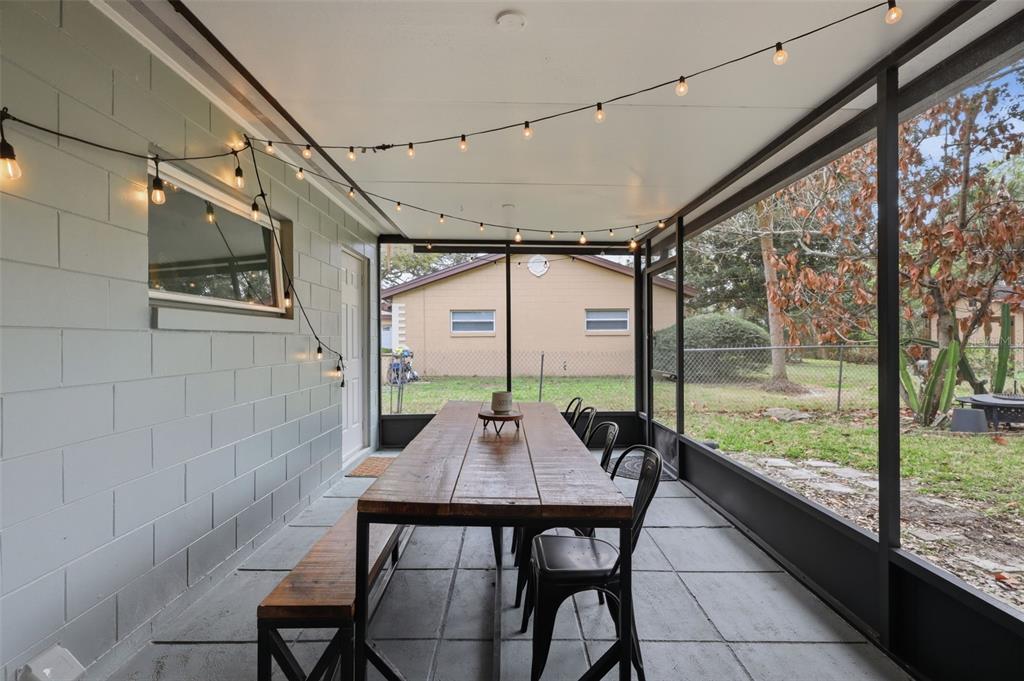 1291 Oxford Road Maitland, FL 32751 - Photo 33 of 37 a dining room with a table and chairs