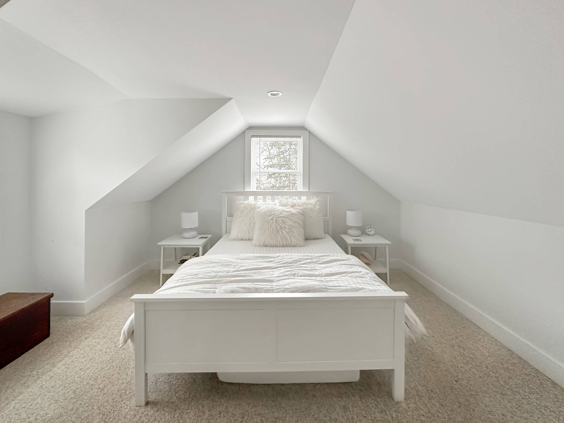 23 Bittersweet Avenue Hampton Bays, NY 11946 - Photo 12 of 17 a bedroom with a bed and window