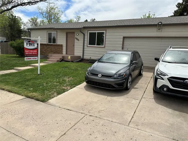 a car parked in front of a house