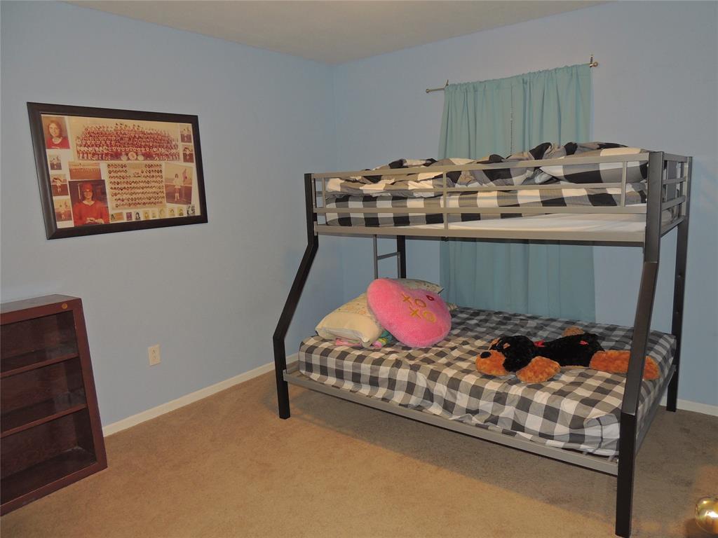 5518 Chimney Rock Road Abilene, TX 79606 - Photo 24 of 29 a bathroom with a sink and a mirror