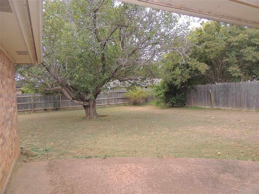 5518 Chimney Rock Road Abilene, TX 79606 - Photo 28 of 29 a view of backyard and tree
