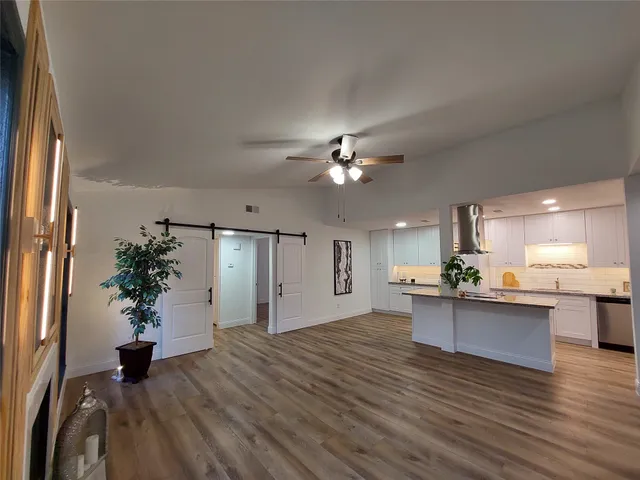 a view of a living room kitchen and a kitchen