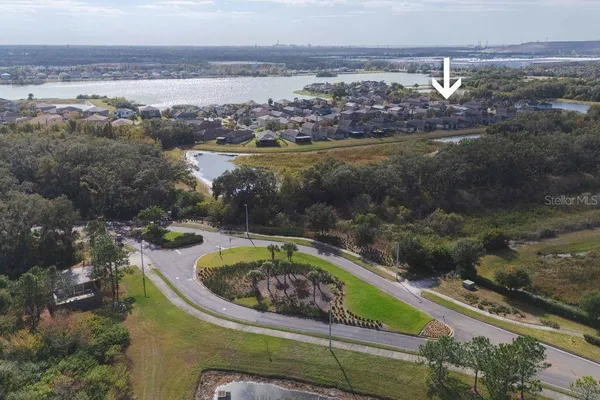 a view of a lake with a yard