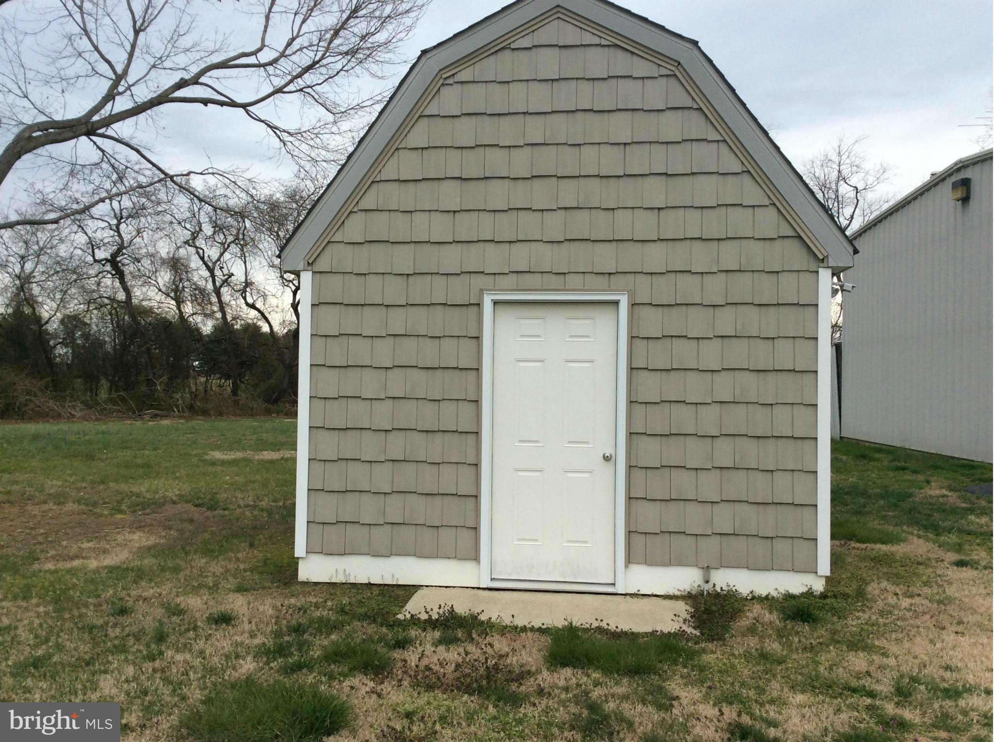 123 Little Neck Road Stevensville, MD 21666 - Photo 28 of 29 Matching Cedar Shake on Shed