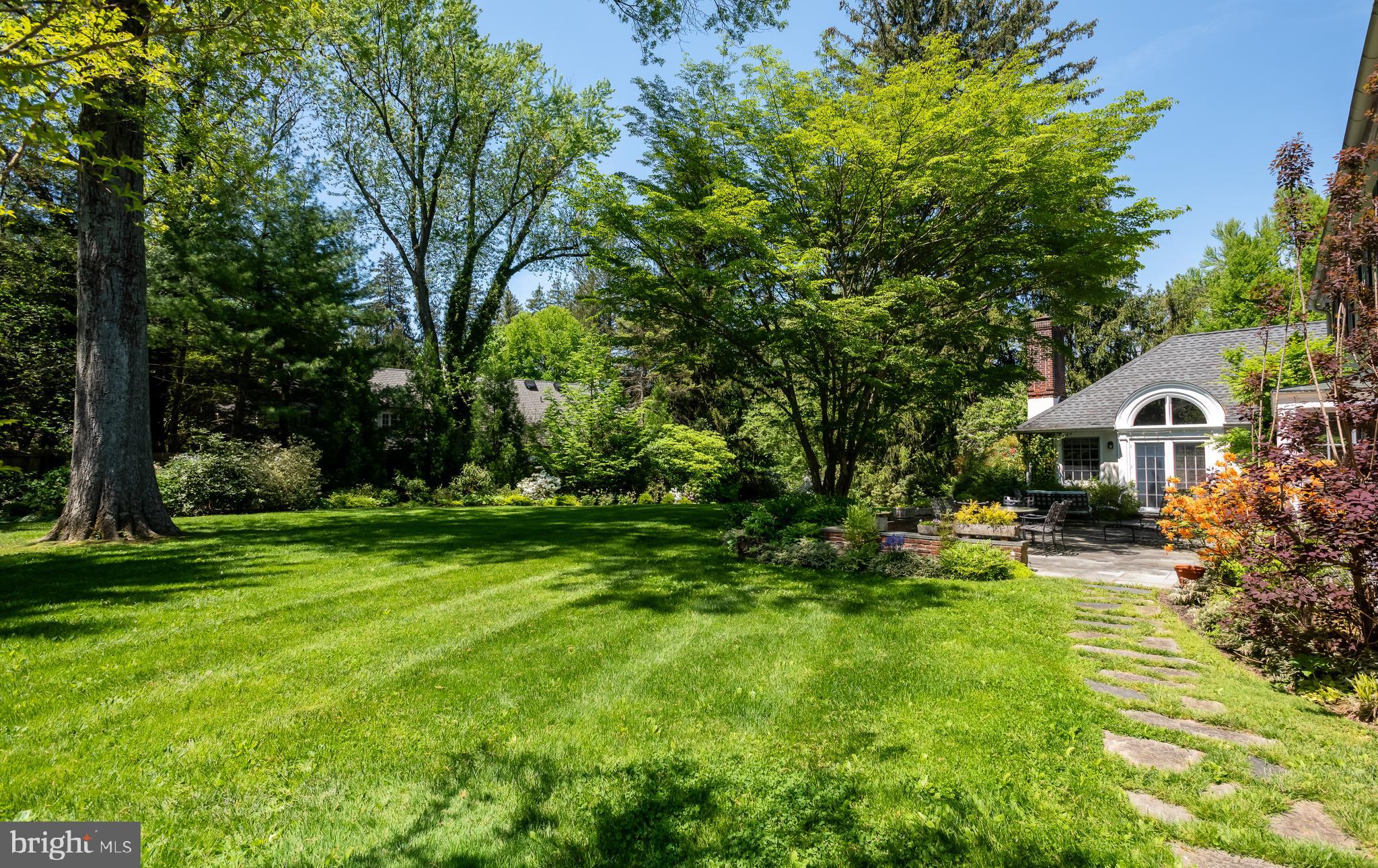 750 Harrison Road Villanova, PA 19085 - Photo 37 of 43 a front view of a house with garden