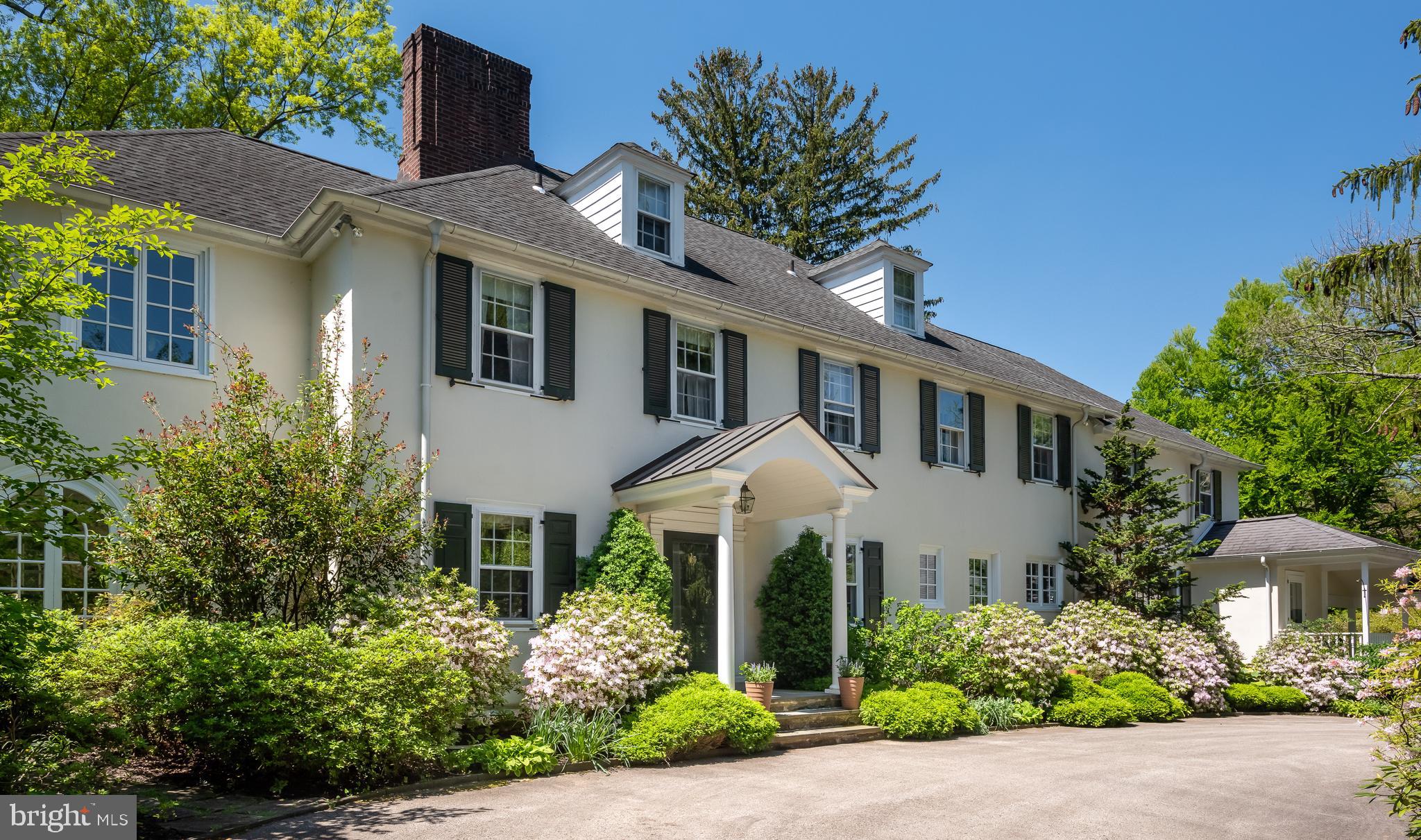750 Harrison Road Villanova, PA 19085 - Photo 4 of 43 a front view of a house with plants and trees