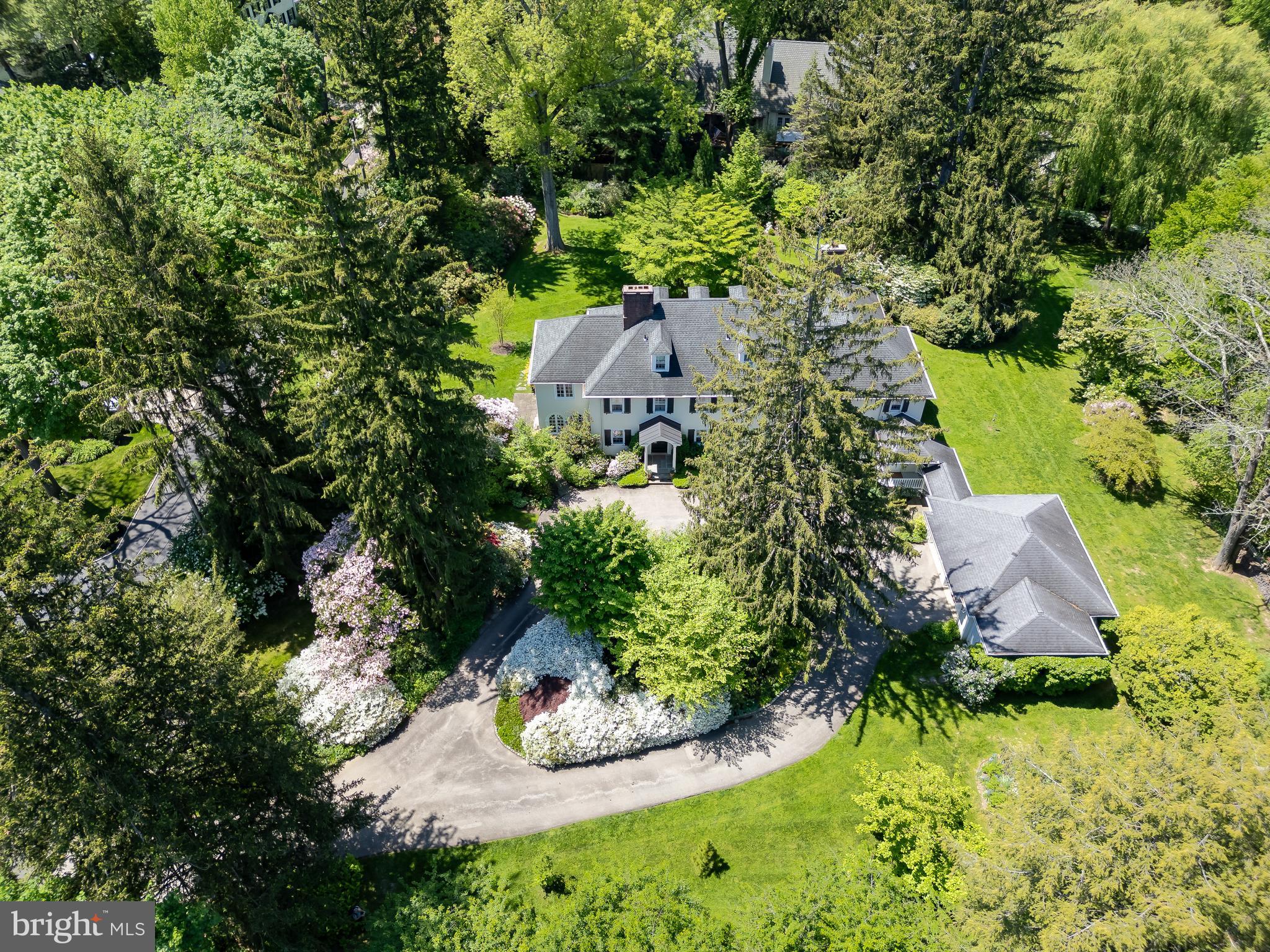 750 Harrison Road Villanova, PA 19085 - Photo 43 of 43 an aerial view of a house with a yard and lake view