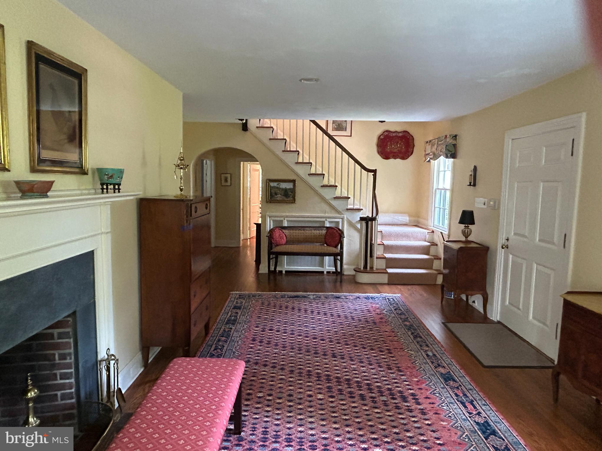 750 Harrison Road Villanova, PA 19085 - Photo 6 of 43 a living room with furniture and a fireplace