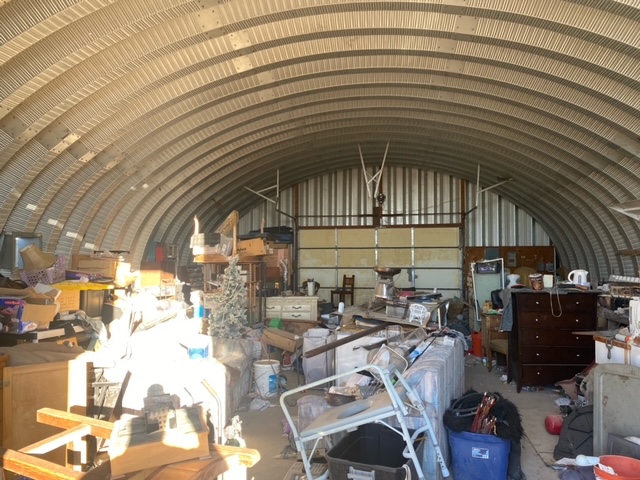 14355 Anegam Road Yucca, AZ 86438 - Photo 12 of 16 Misc room with lofted ceiling and metal wall