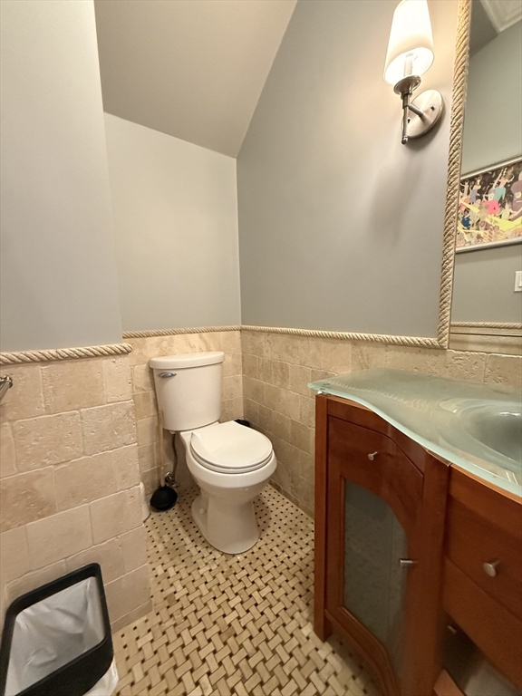161 Tudor Street, Unit 3 Boston, MA 02127 - Photo 17 of 27 a bathroom with a toilet a sink and view