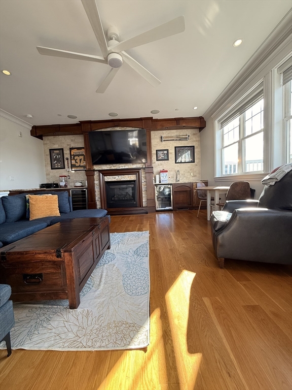 161 Tudor Street, Unit 3 Boston, MA 02127 - Photo 18 of 27 a living room with furniture and a flat screen tv