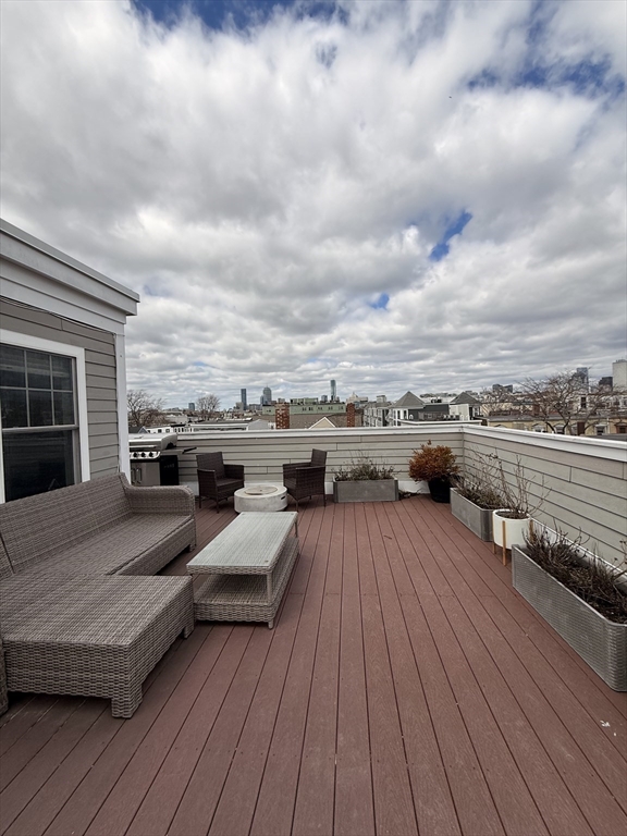 161 Tudor Street, Unit 3 Boston, MA 02127 - Photo 2 of 27 a view of roof deck with patio