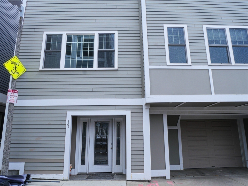 161 Tudor Street, Unit 3 Boston, MA 02127 - Photo 24 of 27 a front view of a house with a window